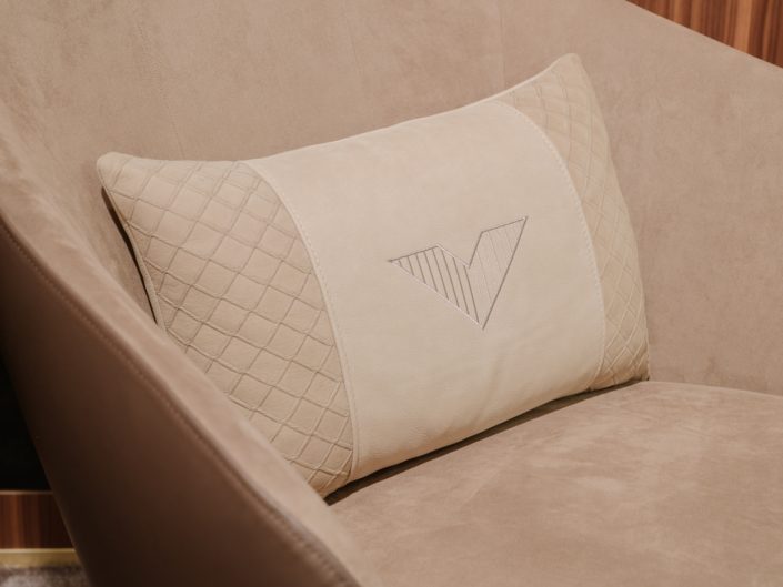 Luxury swivel armchair in leather